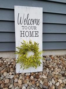 Welcome sign with wreath